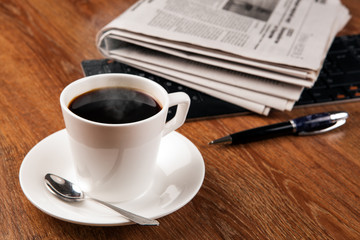 cup of coffee and the newspaper