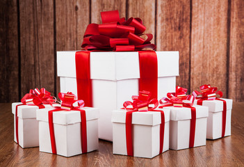one large white gift box and white gift boxes