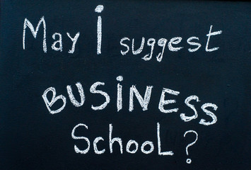 Open for business message handwritten on wooden frame blackboard