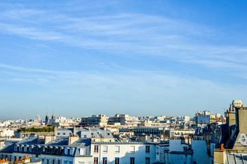 Paris roofs skyline during sunny blue sky day