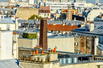 Paris roofs skyline during sunny blue sky day