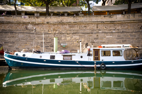 boats at the Canal of Paris France during summer fall time