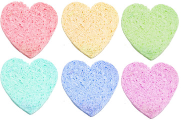 Set of sponge bath heart-shaped isolated on white background