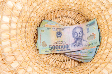 Vietnamese money, dong backnote  inside hat