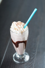chocolate milkshake on blue background