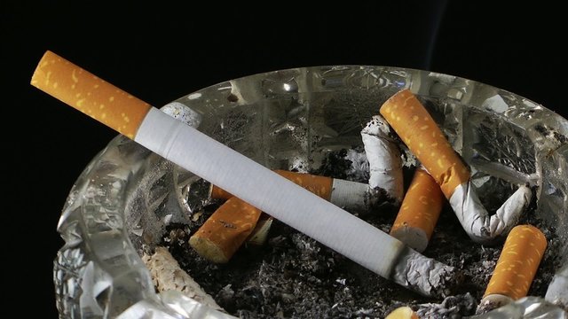 Cigarette in Ashtray Time Lapse