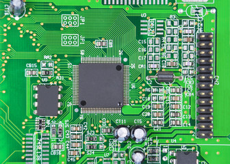 Printed computer motherboard with microcircuit, close up