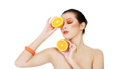 Woman holding orange