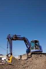 工事現場のパワーショベル