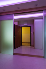 Illuminated purple hall