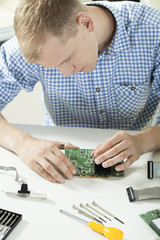 Man trying to repair video card