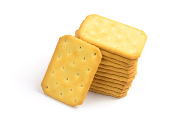 Salty crackers in square shape on white background