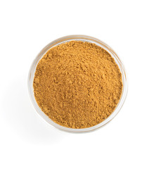 cinnamon powder on white