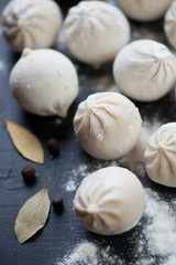 Close-up of raw georgian khinkali, vertical shot