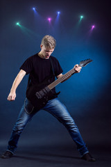 Fototapeta premium Rock musician is playing electrical guitar.