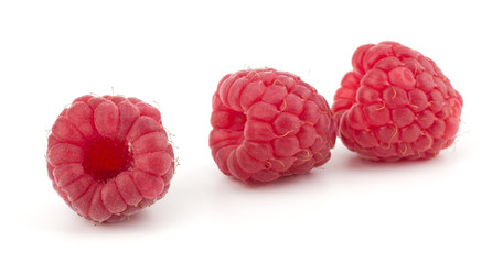 Ripe raspberries isolated on white background