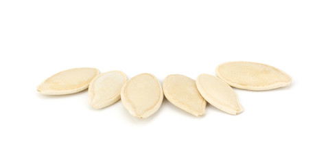 Pumpkin seeds isolated on white background close-up