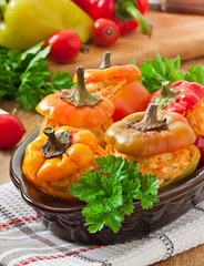 Stuffed peppers minced chicken with carrots with tomato sauce