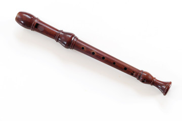 single recorder, musical instrument ??of wood, isolated on white