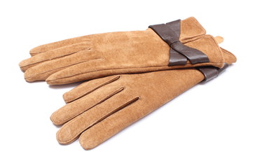 Pair of leather suede gloves for woman. White background