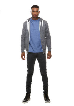 Young black male posing in sweatshirt and jeans