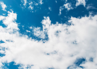 Cloudscape of bright blue sky