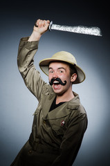 Man in safari hat in hunting concept