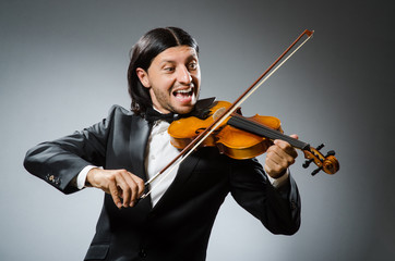 Man violin player in musican concept