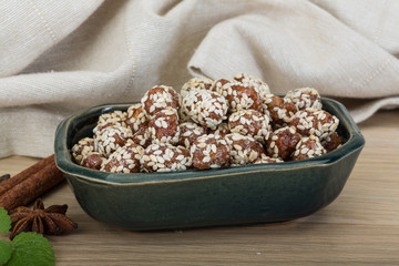 Peanut in honey with sesame seeds