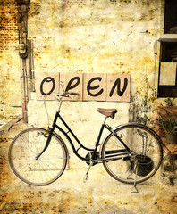 vintage style : open sign and bicycle
