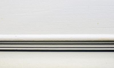 Close up wall with baseboard moulding,interior background