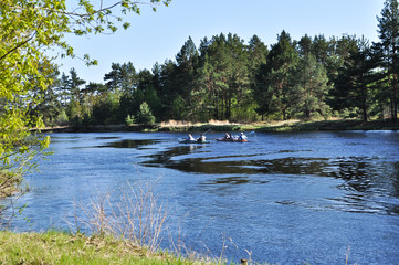 Obraz na płótnie Canvas Kayaking in spring the river.