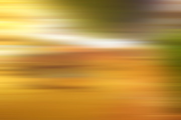 abstract warm yellow background motion blur