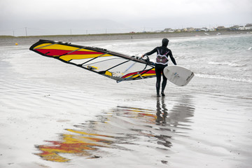 lone Atlantic windsurfer getting ready to surf