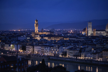Fototapeta na wymiar Aerial night view of Florence, Vecchio Palace, Italy