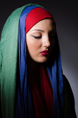 Portrait of the young woman with headscarf