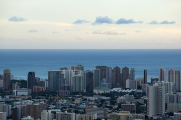 Fototapeta na wymiar Convention Center, Waikiki, Construction cranes and Honolulu Lan