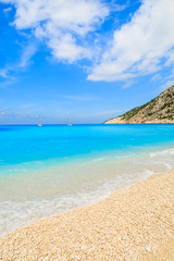 Pebble stones on sandy paradise Myrtos beach, Kefalonia island