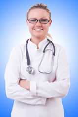 Fototapeta premium Woman doctor isolated on white