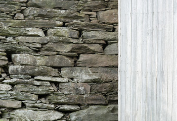 Stone Wall with Wood Siding Background.
