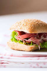 Prosciutto sandwich on plate