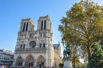 Fototapeta na wymiar Notre Dame with boat on Seine in Paris, France
