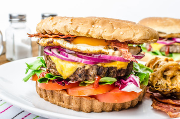Beef burger, red onion and fried egg