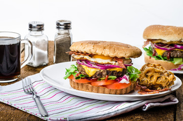 Beef burger, red onion and fried egg
