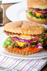 Beef burger, red onion and fried egg