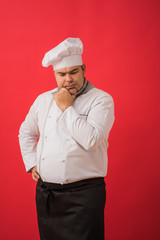 Portrait of caucasian man with chef uniform thinking