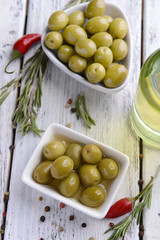 Marinated olives on table close-up