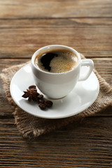 Cup of coffee on wooden table