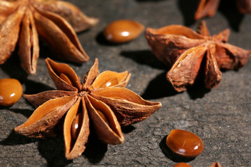 Stars anise on wooden background