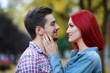 Loving couple in autumn park